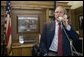 President George W. Bush offers his congratulations to Tour de France winner Lance Armstrong over the phone from this office at Camp David, Maryland. White House photo by Paul Morse