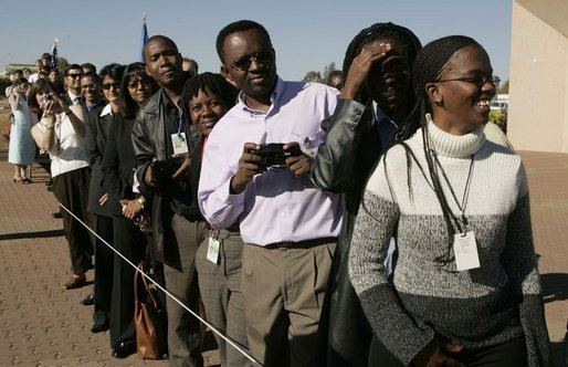 People wait in line to see the departure of Laura Bush Monday, July 11, 2005 at Gaborone International Airport in Gaborone, Botswana. White House photo by Krisanne Johnson