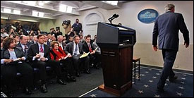 President Bush leaves his final White House briefing; AP photo