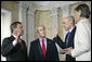 President George W. Bush attends the swearing in of Henry Paulson as the Secretary of Treasury by Supreme Chief Justice John Roberts at the Department of the Treasury Monday, July 10, 2006. White House photo by Eric Draper