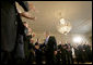 President George W. Bush greets the audience after delivering remarks on the economy and budget, Tuesday, July 11, 2006, in the East Room at the White House. White House photo by Eric Draper