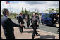 President George W. Bush welcomes President Hu Jintao of the People's Republic of China for a meeting at the G8 Summit in Strelna, Russia, Sunday, July 16, 2006. "The United Nations Security Council unanimously passed a resolution dealing with the North Korean issue, and I want to thank you for your leadership on that, Mr. President," said President Bush. "We're working together on the Iranian issue. We talked about the Middle East. I want to thank you very much for our continued dialogue on bilateral issues. White House photo by Eric Draper