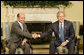 President George W. Bush meets with Romanian President Traian Basescu in the Oval Office Thursday, July 27, 2006. "Romania will continue to remain an ally of the United States in supporting the democracy in Iraq and Afghanistan, in supporting democratic regimes in these countries like a key of freedom on the area," said President Basescu during the two leaders' remarks to the press. White House photo by Eric Draper