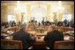 President George W. Bush sits next to Russian President Vladimir Putin during a working session at the G8 Summit at the Konstantinovsky Palace Complex in Strelna, Russia, July 17, 2006. White House photo by Eric Draper