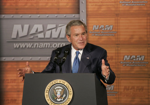 President George W. Bush gestures as he addresses the National Association of Manufacturers on the strength of the U.S. economy Thursday, July 27, 2006, at the Grand Hyatt hotel in Washington, D.C. White House photo by Paul Morse