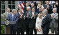 President George W. Bush, joined by Senate and House members, welcomes John and Reve Walsh prior to signing H.R. 4472, the Adam Walsh Child Protection and Safety Act of 2006 at a ceremony Thursday, July 27, 2006, in the Rose Garden at the White House. The bill is named for the Walsh’s six-year-old son Adam Walsh who was abducted and killed 25 years ago. White House photo by Paul Morse