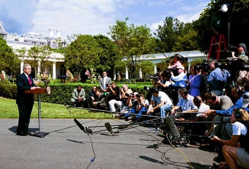 President George W. Bush announces the resignation of CIA Director George Tenet upon his departure from the White House to Rome, Italy, Thursday, June 3, 2004. White House photo by Joyce Naltchayan.