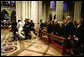 President George W. Bush and Laura Bush, Vice President Dick Cheney and Lynne Cheney, along with four former US Presidents, and other world dignitaries watch as the casket of former President Ronald Reagan is carried into the National Cathedral in Washington, D.C., Friday, June 11, 2004. White House photo by David Bohrer.