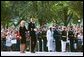 Nancy Reagan looks on as former President Ronald Reagan's casket is transfered onto a horse-drawn caisson at 1600 Constitution Avenue near the White House , Wednesday, June 9, 2004. White House photo by Joyce Naltchayan.