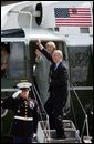 Heading to the G8 summit at Sea Island, Ga., Canadian Prime Minister Paul Martin and his wife Sheila Martin wave during their arrival at Hunter Army Airfield Tuesday, June 8, 2004. White House photo by Paul Morse