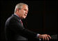 President George W. Bush delivers his remarks regarding his National Strategy for Pandemic Influenza Preparedness and Response at the National Institute of Health in Bethesda, Md., Tuesday, Nov. 1, 2005. "At this point, we do not have evidence that a pandemic is imminent. Most of the people in Southeast Asia who got sick were handling infected birds," said President Bush. "And while the avian flu virus has spread from Asia to Europe, there are no reports of infected birds, animals, or people in the United States. Even if the virus does eventually appear on our shores in birds, that does not mean people in our country will be infected. Avian flu is still primarily an animal disease. And as of now, unless people come into direct, sustained contact with infected birds, it is unlikely they will come down with avian flu." White House photo by Paul Morse