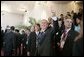 President George W. Bush gives the thumbs-up to well-wishers Friday, Nov. 4, 2005, as he attended the opening ceremonies of the 2005 Summit of the Americas at the Teatro Auditorium in Mar del Plata, Argentina. White House photo by Eric Draper