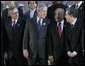 President George W. Bush is joined by leaders of the Americas Friday, Nov. 4, 2005, during the 2005 Summit of the Americas class photo in Mar del Plata, Argentina. Joining him in the front row are, from left: President Eduardo Rodriguez of Bolivia; Prime Minister Owen Arthur of Barbados; and Colombia President Alvaro Uribe. White House photo by Eric Draper