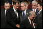 President George W. Bush spends a moment with Mexico's President Vicente Fox following the opening ceremonies Friday, Nov. 4, 2005, of the 2005 Summit of the Americas at the Teatro Auditorium in Mar del Plata, Argentina. White House photo by Eric Draper