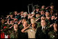 Staff and Army personnel welcome President George W. Bush, during his introduction, Friday, Nov. 11, 2005 at the Tobyhanna Army Depot in Tobyhanna, Pa. White House photo by Eric Draper