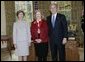 President George W. Bush and Laura Bush stand with 2005 National Humanities Medal recipient Mary Ann Glendon, legal scholar, Thursday, Nov. 10, 2005 in the Oval Office at the White House. White House photo by Eric Draper