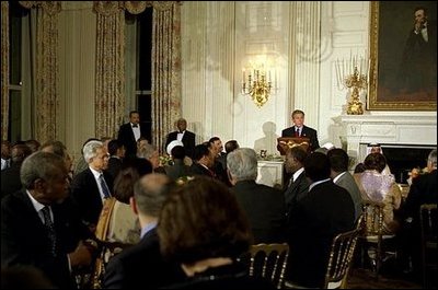President George W. Bush hosts an Iftaar dinner celebrating Ramadan at the White House Monday, Oct. 28, 2003. "For Muslims in America, and around the world, this holy time is set aside for prayer and fasting," said President Bush. "It is also a good time for people of all faiths to reflect on the values we hold common -- love of family, gratitude to God, and a commitment to religious freedom." White House photo by Susan Sterner. White House photo by Susan Sterner
