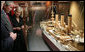 President George W. Bush listens as Mary-Louise Williams, director of the Australian National Maritime Museum, describes one of the exhibits on display during a tour Thursday, Sept. 6, 2007, in Sydney. White House photo by Eric Draper