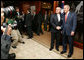 President George W. Bush and Prime Minister John Howard of Australia, shake hands as they meet for the start of a daylong visit Wednesday, Sept. 5, 2007, at the Commonwealth Parliament Offices in Sydney. White House photo by Eric Draper