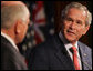 President George W. Bush acknowledges his host, Australia's Prime Minister John Howard, during their joint press availability Wednesday, Sept. 5, 2007, in Sydney. White House photo by Chris Greenberg