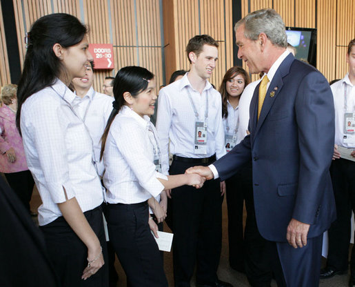 President George W. Bush greets APEC staff outside the Concert Hall at the Sydney Opera House Friday, Sept. 7, 2007, after addressing the APEC Business Summit. White House photo by Eric Draper