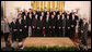 President George W. Bush poses for a photo Friday, Feb. 2, 2007, with the Carolina Hurricanes, winners of the 2006 Stanley Cup, in the East Room of the White House. White House photo by Paul Morse