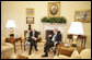 President George W. Bush and President Valdas Adamkus of Lithuania meet Monday, Feb. 12, 2007, in the Oval Office of the White House. White House photo by Eric Draper