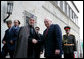 Vice President Dick Cheney shakes hands with Afghan President Hamid Karzai, Tuesday, Feb. 27, 2007 as the two leaders met at the presidential palace in Kabul to discuss regional issues. White House photo by David Bohrer