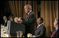 President George W. Bush speaks at the National Prayer Breakfast in Washington, D.C., Thursday, Feb. 1, 2007. Laura Bush, not pictured, also attended the event. White House photo by Eric Draper