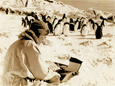 Geoffrey Lee Martin types out a newspaper story at Cape Royds, Antarctica, in January 1956.