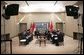 Before the beginning of an APEC summit, President George W. Bush talks with Indonesian President Susilo Yudhoyono in Santiago, Chile, Nov. 20, 2004. White House photo by Eric Draper