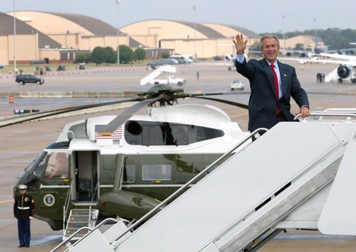 President George W. Bush boards Air Force One at Andrews Air Force Base en route to Colmar, Pa., Thursday, Sept. 9, 2004. White House photo by Tina Hager.