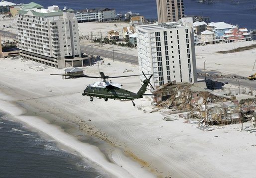 President George W. Bush aboard Marine One takes an aerial tour of damage caused by Hurricane Ivan in Orange Beach, Alabama, Sunday, Sept. 19, 2004. White House photo by Eric Draper