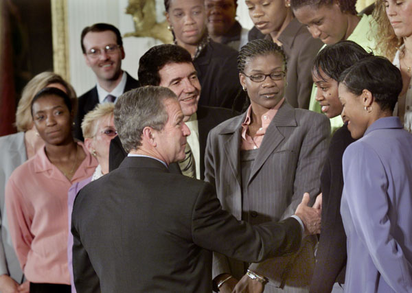 President George W. Bush greets members of the WNBA's Houston Comet's during a Photo Op in the East Room, Monday, May 14. WHITE HOUSE PHOTO BY ERIC DRAPER