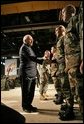 Vice President Dick Cheney congratulates troops during a Re-enlistment Ceremony at Fort Drum, N.Y., Tuesday, Dec. 6, 2005. During his visit, the Vice President also participated in a Purple Heart Award Ceremony and met one-on-one with troops. White House photo by David Bohrer