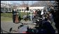 President George W. Bush speaks to reporters on the South Lawn of the White House Wednesday, Dec. 21, 2005, before boarding Marine One for Maryland. Urging Senate to reauthorize the Patriot Act and pass the defense bill, the President said, "There is an enemy that lurks, a dangerous group of people that want to do harm to the American people. and we must have the tools necessary to protect the American people. " White House photo by Kimberlee Hewitt