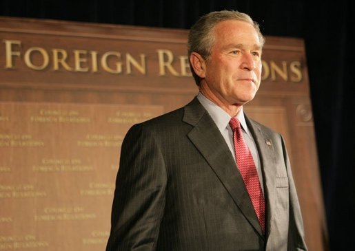 President George W. Bush is introduced at a meeting of the Council on Foreign Relations, Wednesday, Dec. 7, 2005 in Washington, where he spoke on the war on terror and the rebuilding of Iraq. White House photo by Paul Morse