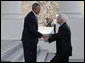 President George W. Bush shakes hands with Senator John McCain (R-Ariz.) as he arrived Wednesday, March 5, 2008, at the North Portico of the White House with his wife, Cindy. White House photo by Eric Draper