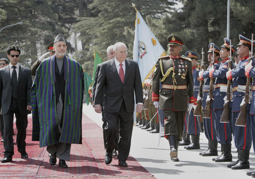 Vice President Dick Cheney, accompanied by President Hamid Karzai of Afghanistan, reviews an honor guard upon his arrival to Kabul Thursday, March 20, 2008. The Vice President's visit to Afghanistan is the third stop on a 10-day trip to the Middle East and Turkey. White House photo by David Bohrer