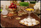 A traditional Haft Sin table celebrating Nowruz, the Persian New Year, is seen set Wednesday, March 19, 2008, in the State Dining Room of the White House. Nowruz is, in Persian and some other cultures, including Kurdish culture, a family-oriented holiday celebrating the New Year and the coming of spring. The Haft Sin table has seven items symbolizing new life, joy, love, beauty and health, sunrise, patience and garlic to ward off evil. White House photo by Chris Greenberg