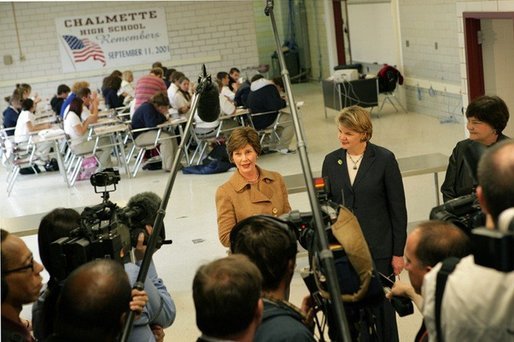 Laura Bush and U.S. Secretary of Education Margaret Spellings talk with reporters following their visit with staff and students Wednesday, Jan. 26, 2006 at the St. Bernard Unified School in Chalmette, La. The school is rebuilding after being ravaged in Hurricane Katrina. White House photo by Shealah Craighead