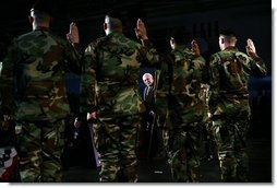 Vice President Dick Cheney administers the Ceremonial Oath of Re-enlistment at a rally for the troops at Fort Leavenworth, Kansas, January 6, 2006. Prior to the ceremony the Vice President delivered remarks and commended the troops for their service in Iraq, Afghanistan and in the war on terrorism. Fort Leavenworth holds the title as the oldest Army installation in continuous active service west of the Mississippi.  White House photo by David Bohrer