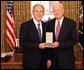 President George W. Bush stands with James Billington after presenting him with the 2008 Presidential Citizens Medal Wednesday, Dec. 10, 2008, in the Oval Office of the White House. White House photo by Chris Greenberg