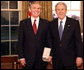 President George W. Bush stands with Raymond "Ray" Chambers after presenting him with the 2008 Presidential Citizens Medal Wednesday, Dec. 10, 2008, in the Oval Office of the White House. White House photo by Chris Greenberg