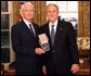 President George W. Bush stands with Don Powell after presenting him with the 2008 Presidential Citizens Medal Wednesday, Dec. 10, 2008, in the Oval Office of the White House. White House photo by Chris Greenberg