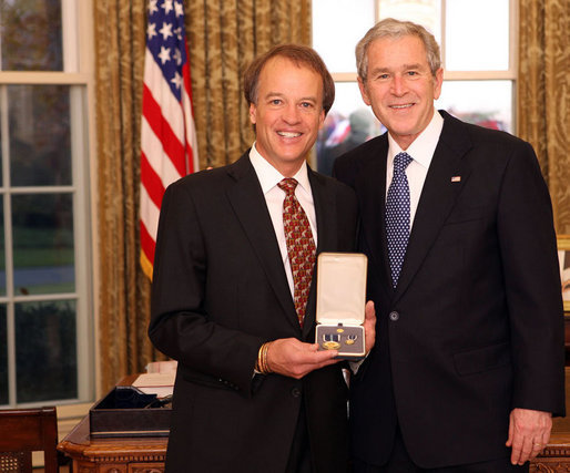 President George W. Bush stands with Ward Brehm after presenting him with the 2008 Presidential Citizens Medal Wednesday, Dec. 10, 2008, in the Oval Office of the White House. White House photo by Chris Greenberg