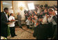 White House Executive Chef Cristeta Comerford discusses the evening's menu with the press in the State Dining Room Thursday, June 29, 2006. The entrée for the dinner is Texas Kobe Beef with cracked black pepper, shitake mushroom jus, silver corn pilaf and sesame-coated wild asparagus. White House photo by Shealah Craighead