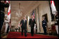 President George W. Bush and Japan’s Prime Minister Junichiro Koizumi walk through Cross Hall on their way to a joint press availability Thursday, June 29, 2006, in the East Room of the White House. White House photo by Paul Morse