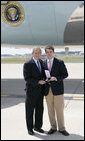 President George W. Bush presents the 2006 Presidential Scholars medal to Andrew Benecke, 18, Wednesday, June 28, 2006 at Lambert Field in St. Louis, Mo. Benecke was unable to attend the awards ceremony in Washington earlier this month because he was undergoing chemotherapy in his fight against bone cancer. White House photo by Kimberlee Hewitt