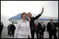 President George W. Bush waves as he and Laura Bush arrive at Budapest-Ferihegy Airport in Budapest Wednesday night, June 21, 2006, on the last leg of their journey to Europe. White House photo by Eric Draper